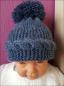 Preview: Baby Mütze mit Bommel, gestrickt